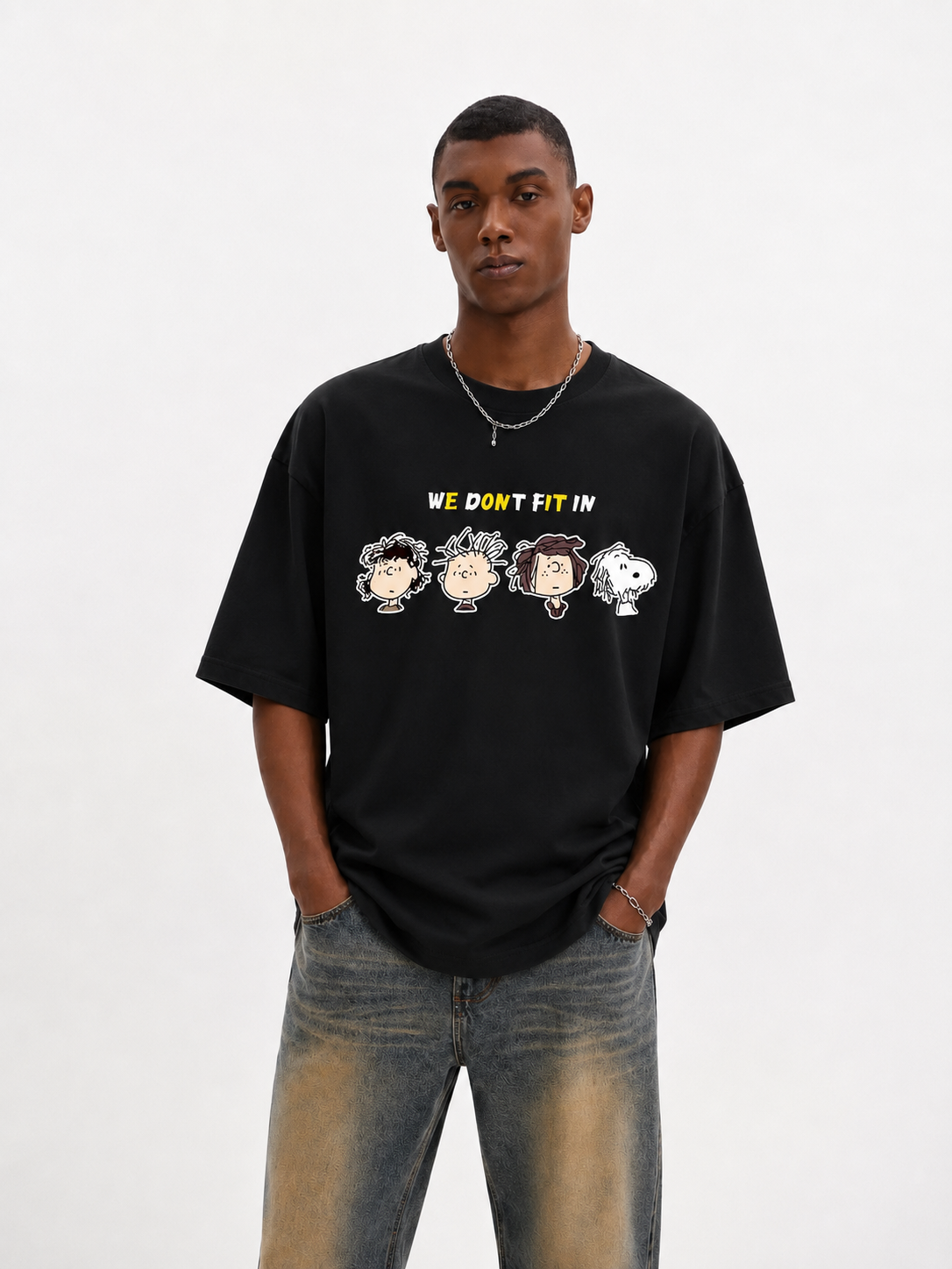 We Don't Fit In Cartoon Graphic Black T-Shirt Main image